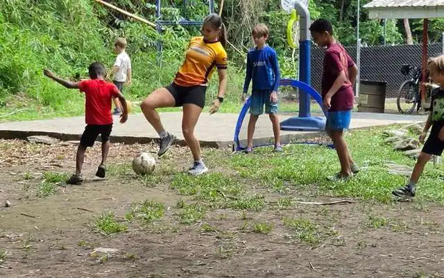 Children playing football on the grounds